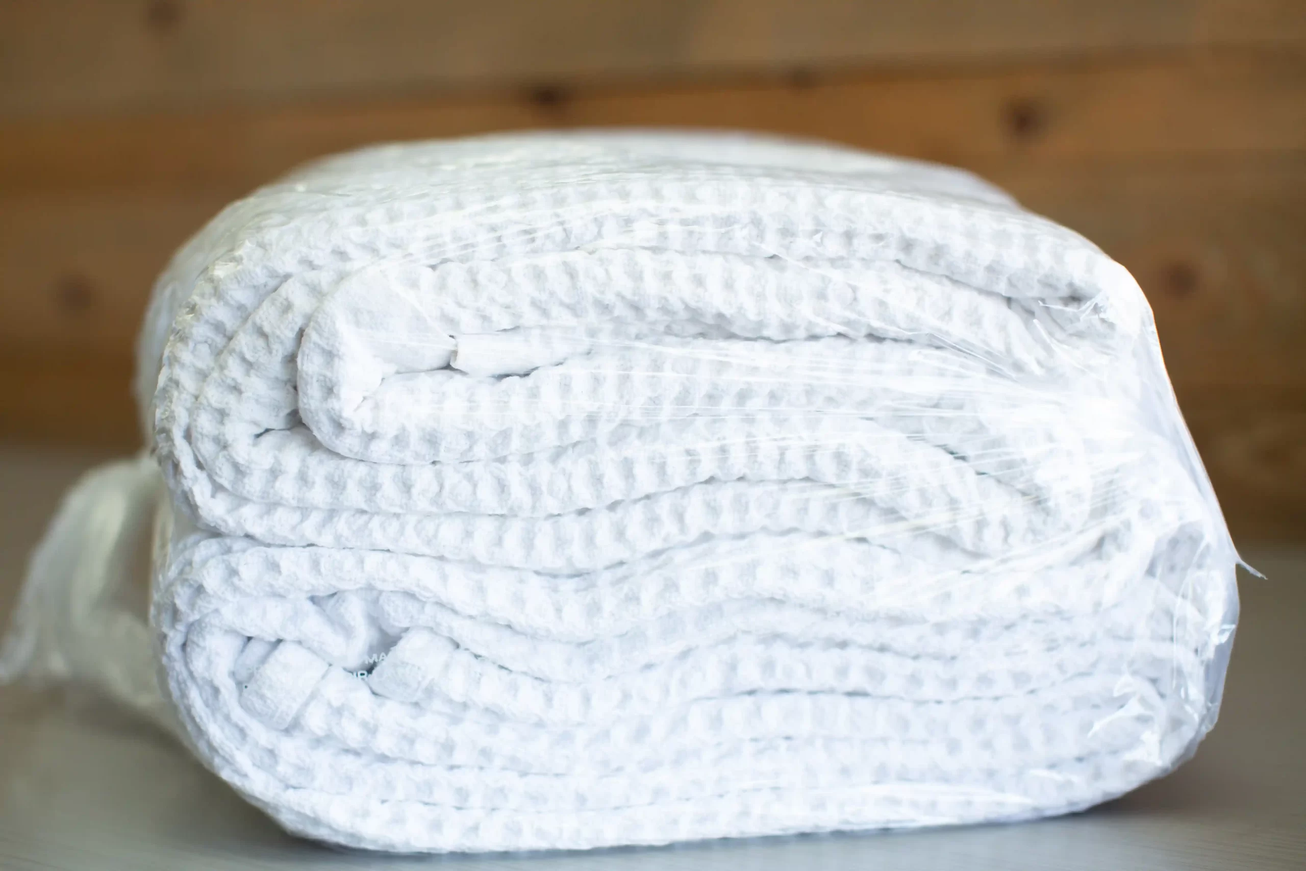 Clean AirBnB towel packaged and ready for delivery