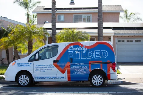 Freshly Folded delivery van on a residential street